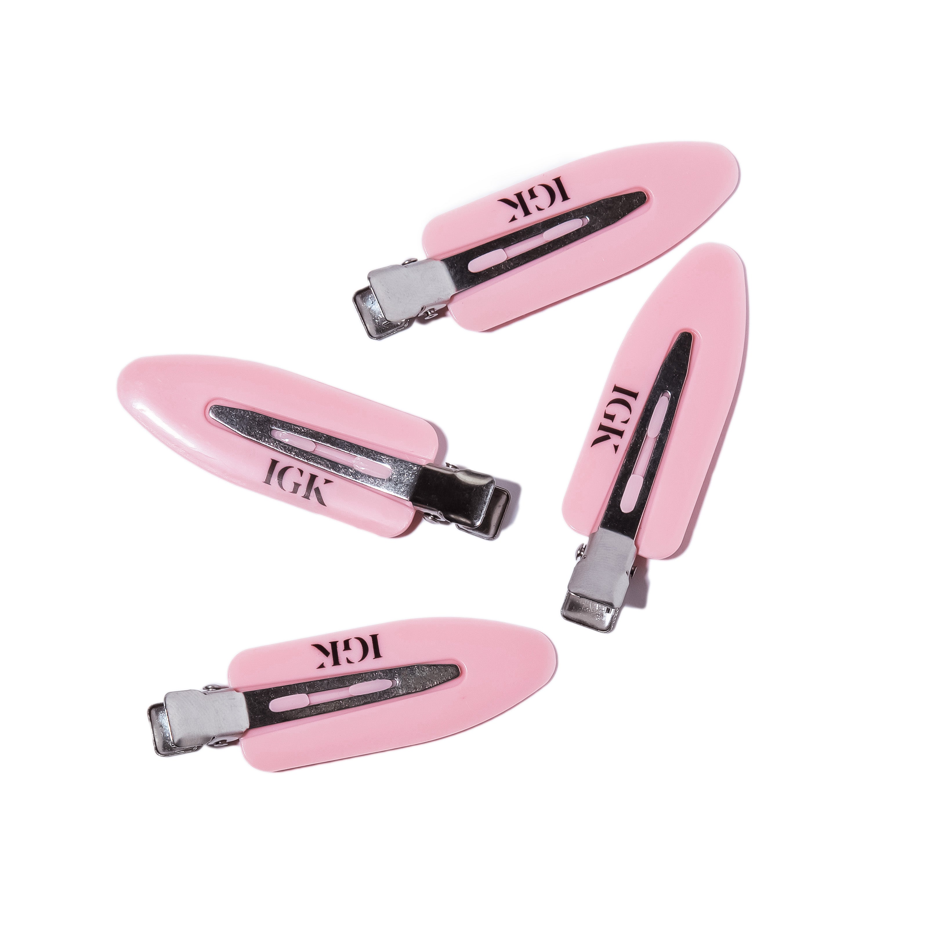 a group of pink nail clippers