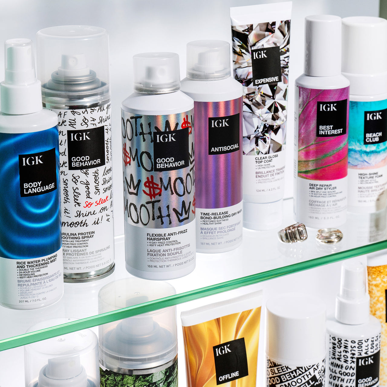 a group of bottles of hair products on a shelf